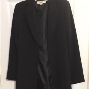 Calf length black blazer.